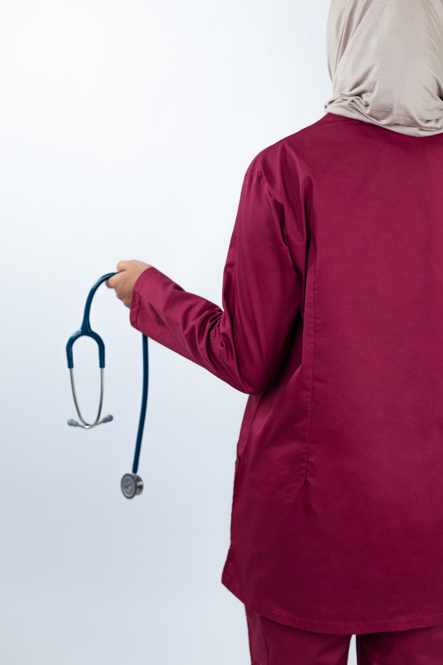The Long-Sleeve Slim Fit Medical Scrubs in Ruby Red